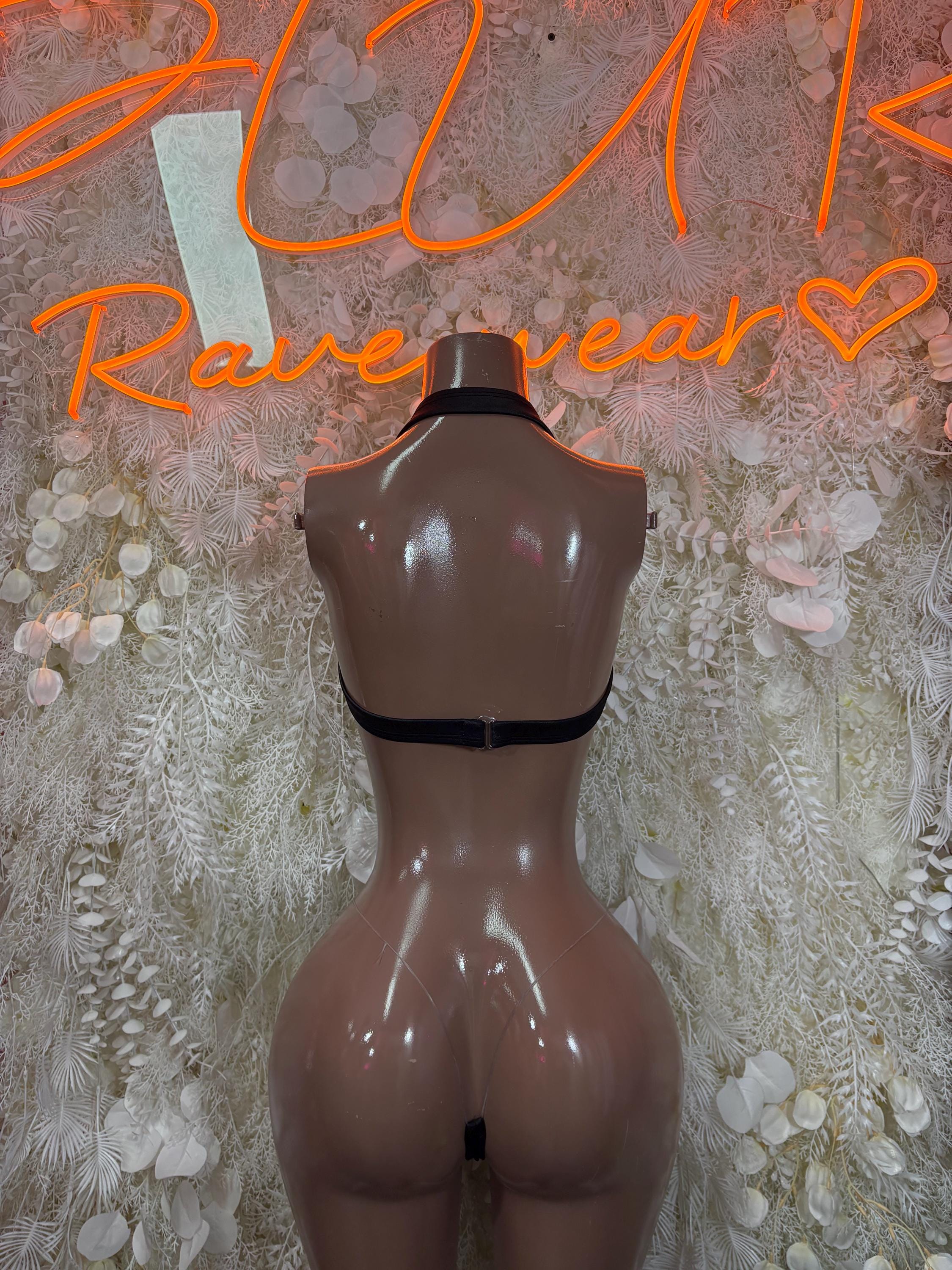 Black two-piece rave outfit with sparkle-trim top and thong briefs, open back