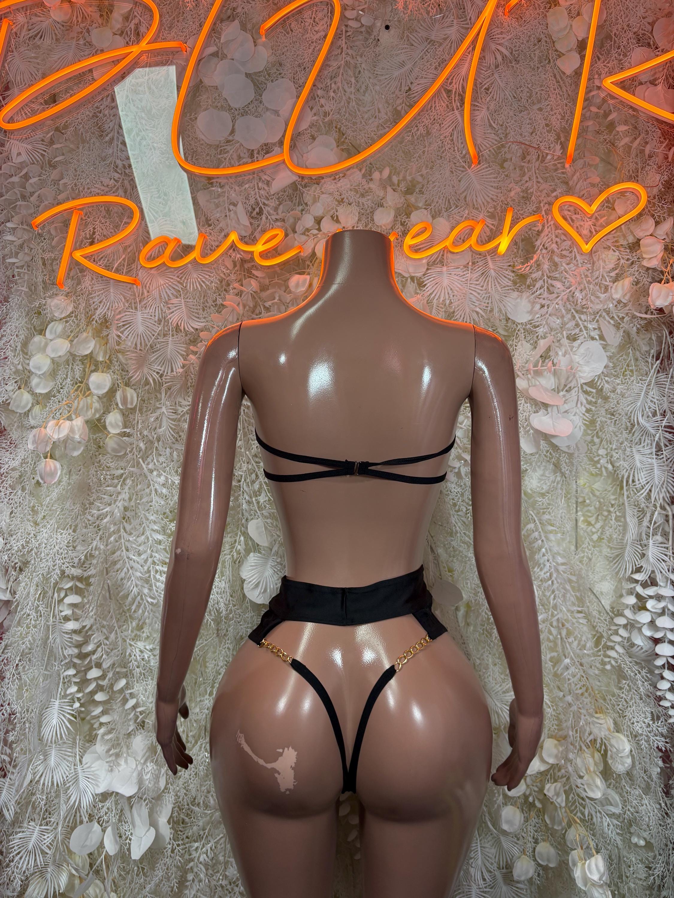 Black fishnet two-piece set back view: strappy halter top and high-rise thong briefs