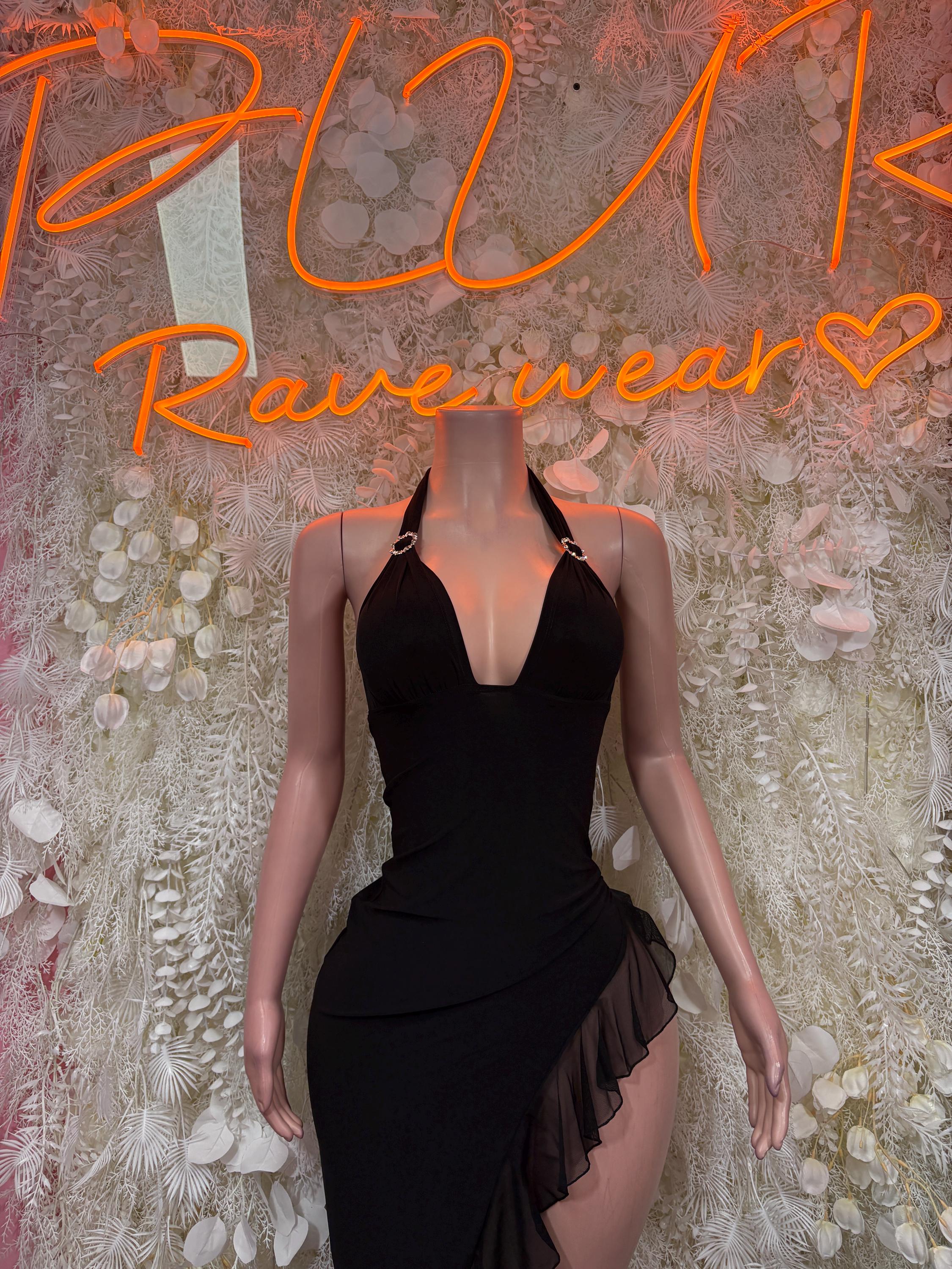 Black halter dance gown with deep V neckline and layered ruffle skirt