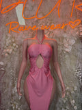 Pink halter cutout gown with ruched bodice and keyhole front