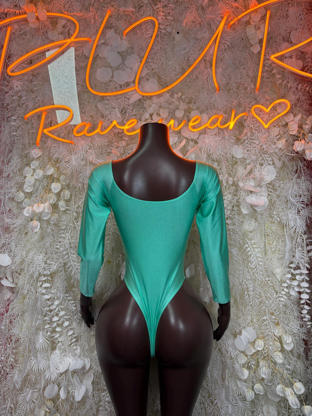 Teal long-sleeve bodysuit with scoop back and high-cut legs