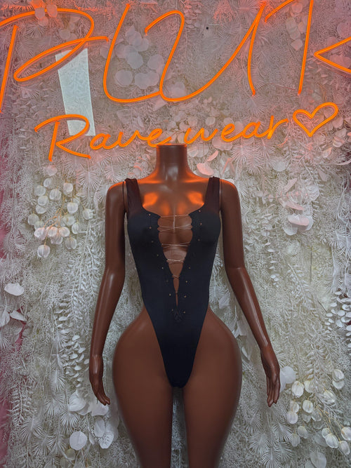 Black lace-up bodysuit with deep V neckline and high-cut legs