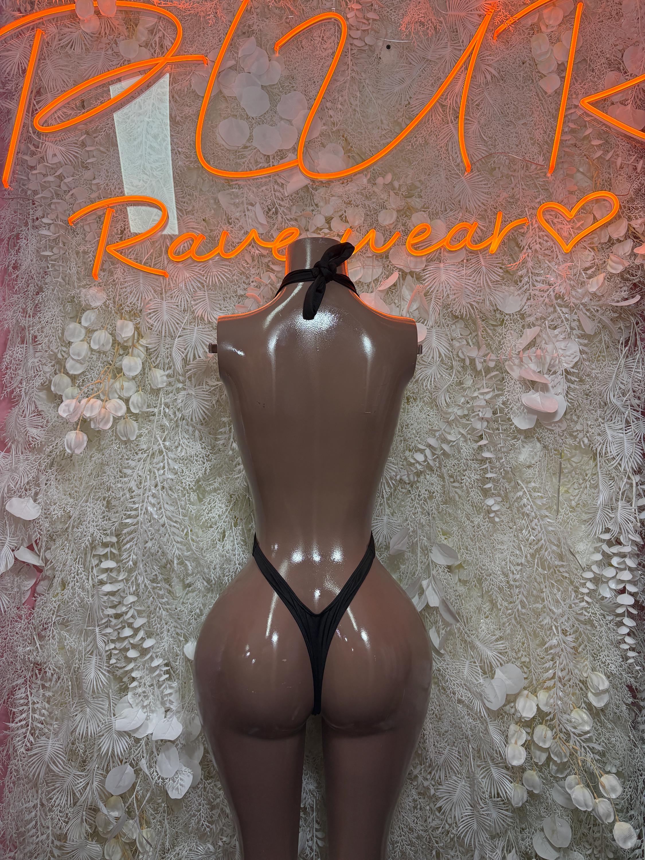 Black halter bodysuit with open back cutout and thin shoulder straps