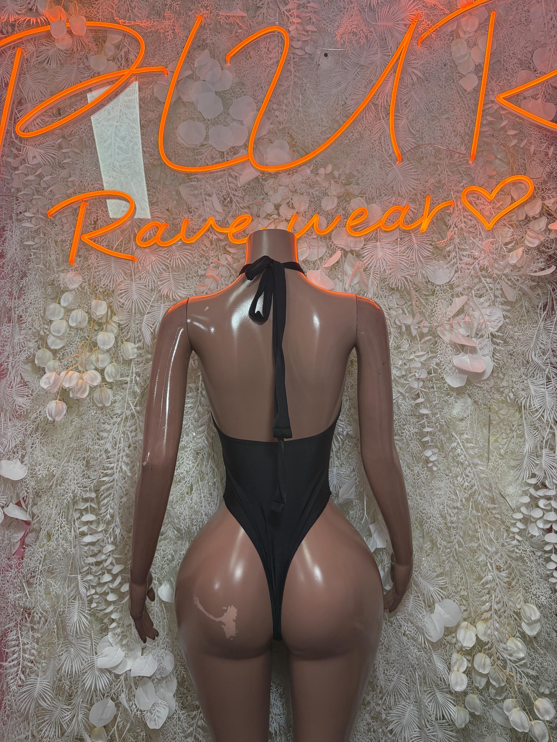 Black halter bodysuit with open back and center tie at neck