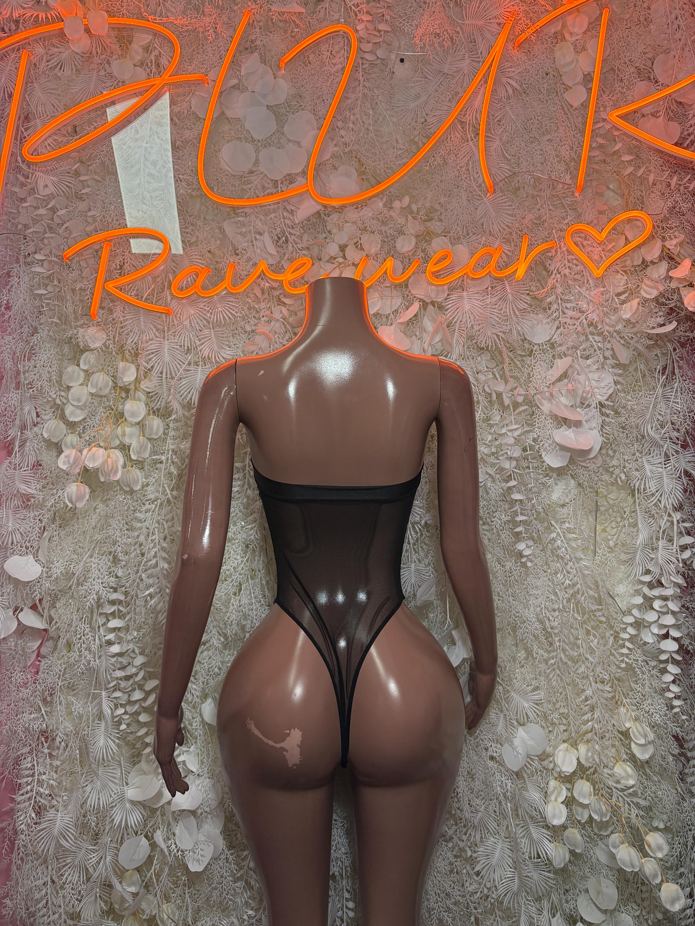 Black bodysuit one-piece with open back and sheer mesh panels