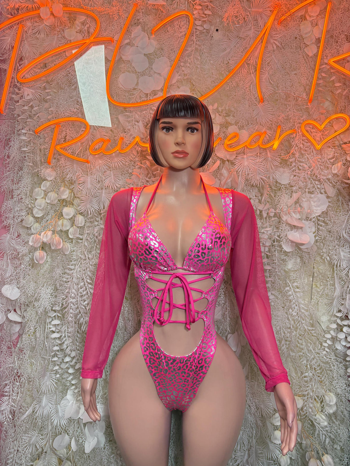 Pink cheetah-print metallic bodysuit with lace-up cutout and long sheer sleeves