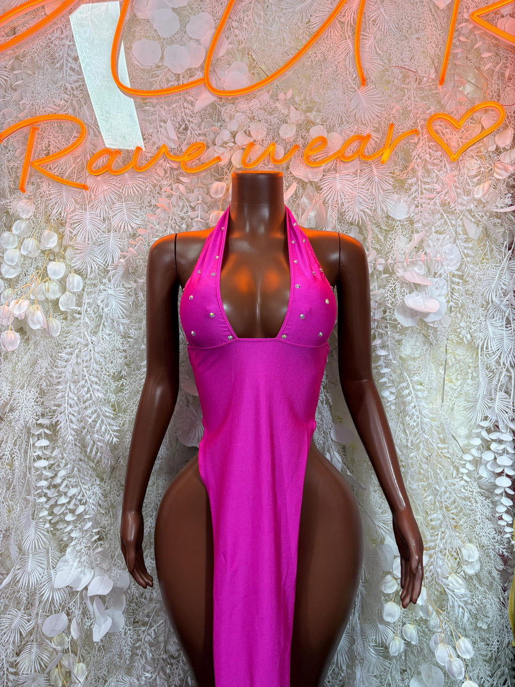 Pink halter gown with deep V neckline and studded straps