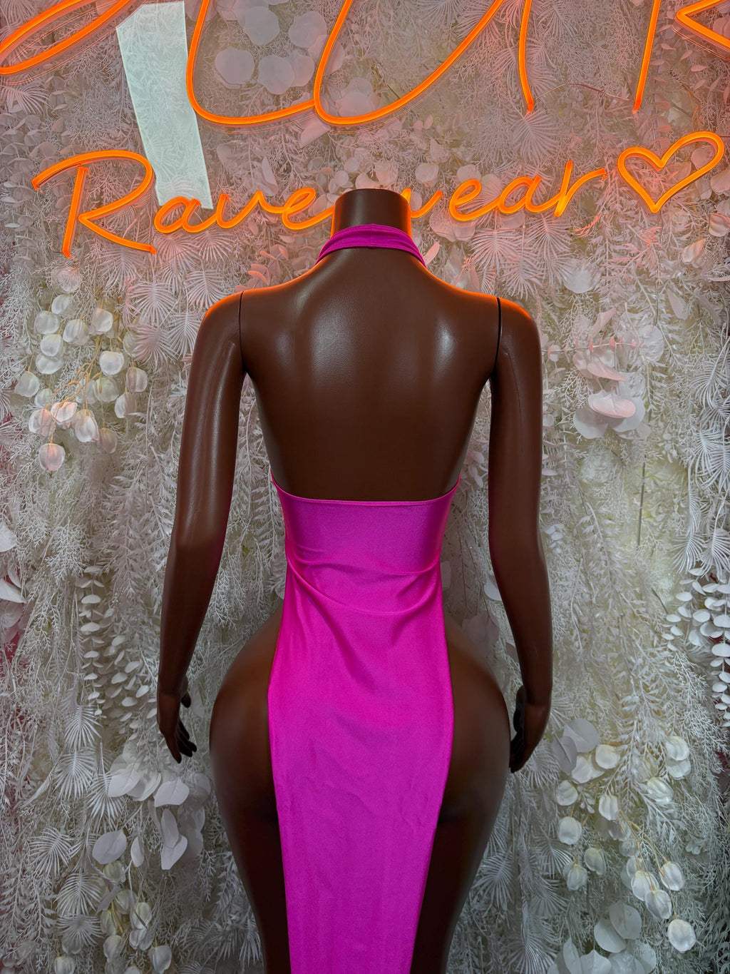 Pink halter gown with open back and ruched bodice