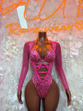 Hot pink leopard print metallic bodysuit with long sleeves and crisscross lace-up front