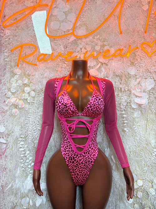 Hot pink leopard print metallic bodysuit with long sleeves and crisscross lace-up front