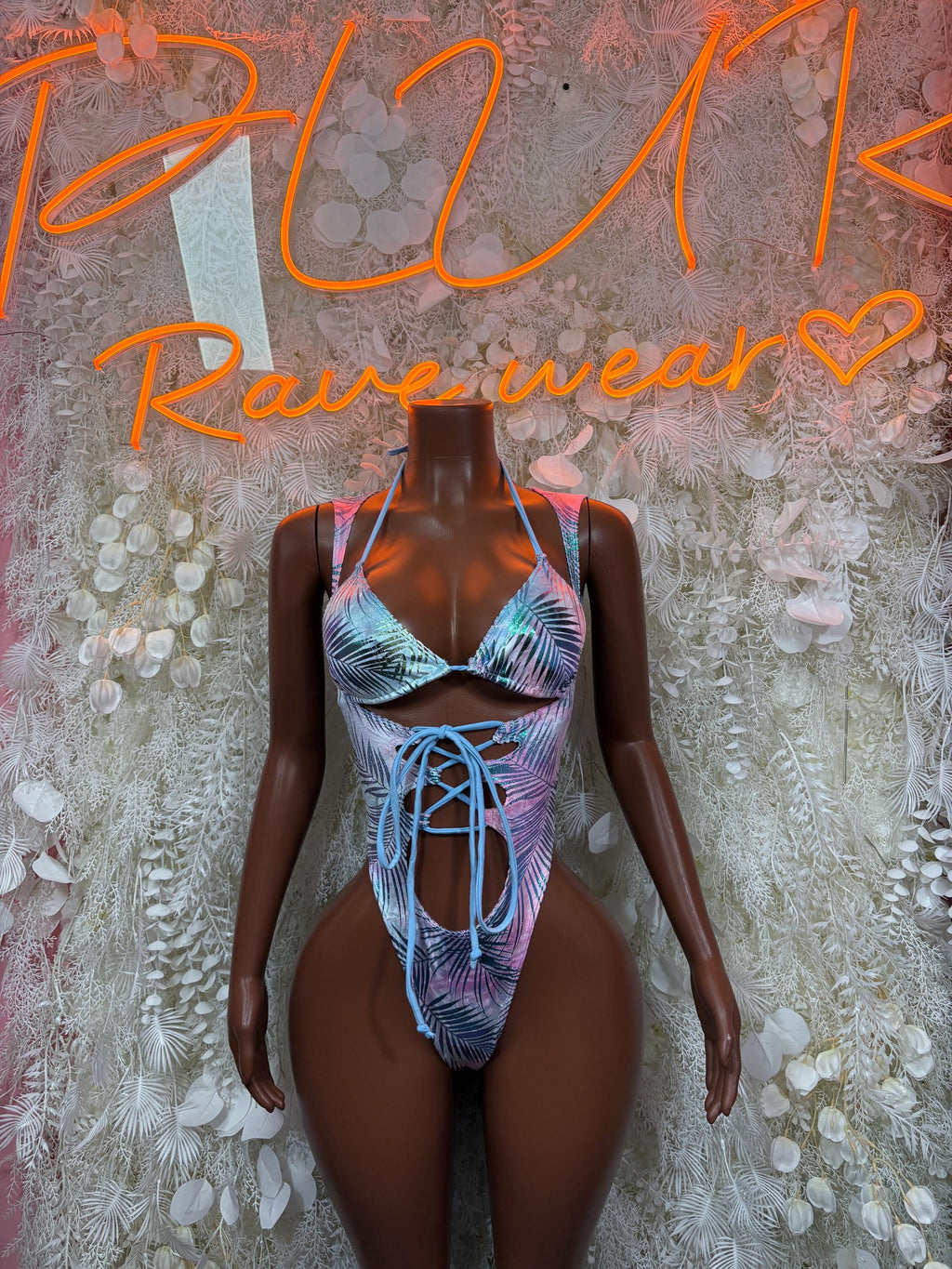 Blue tropical print bodysuit with lace-up front and ruched string tie