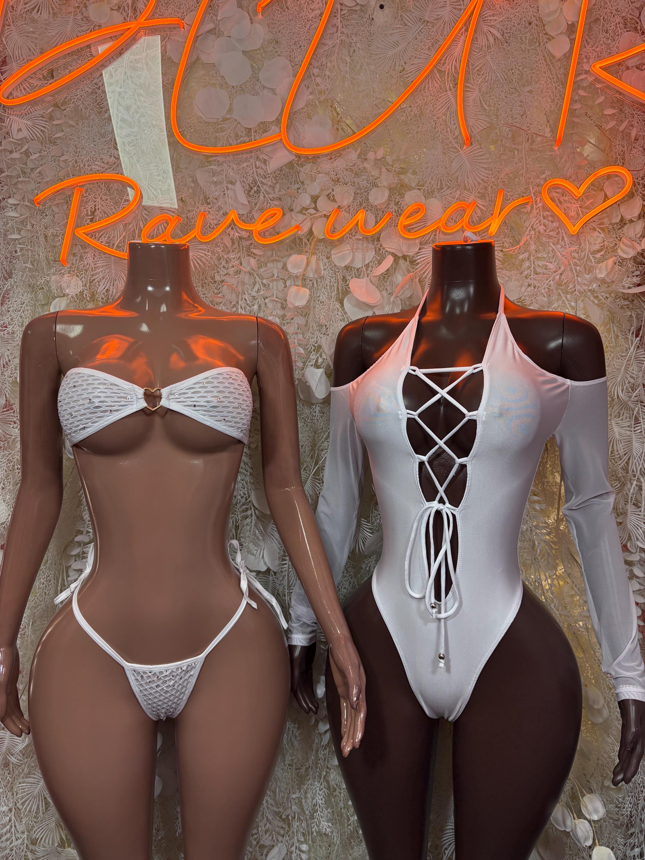 White lace-up bodysuit with crisscross front ties and thong cut, long sleeves