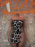 Leopard print mini dress with black mesh sleeves and scoop neckline