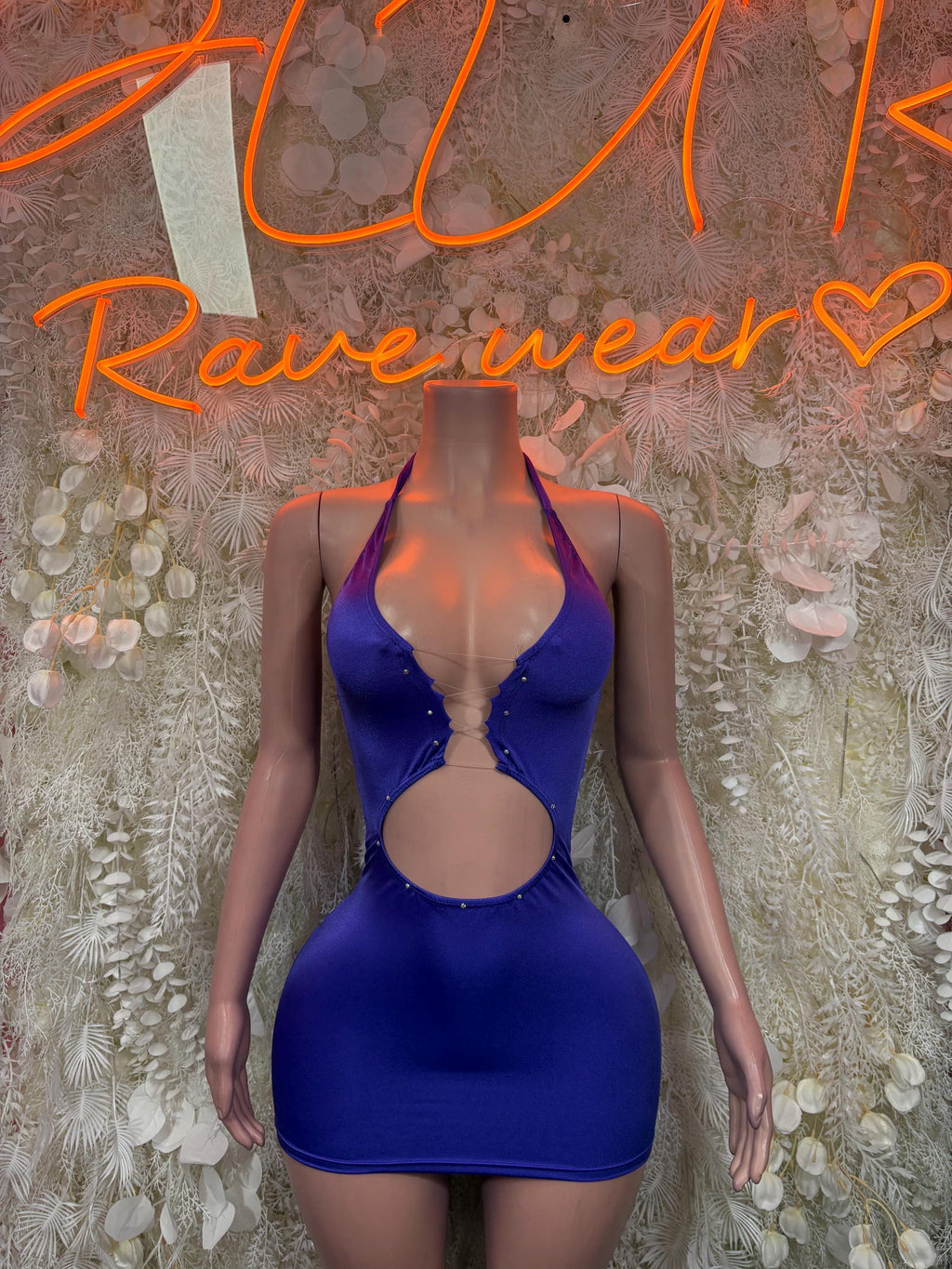 Purple halter cutout mini dress with side-bust cutouts and fitted bodycon silhouette