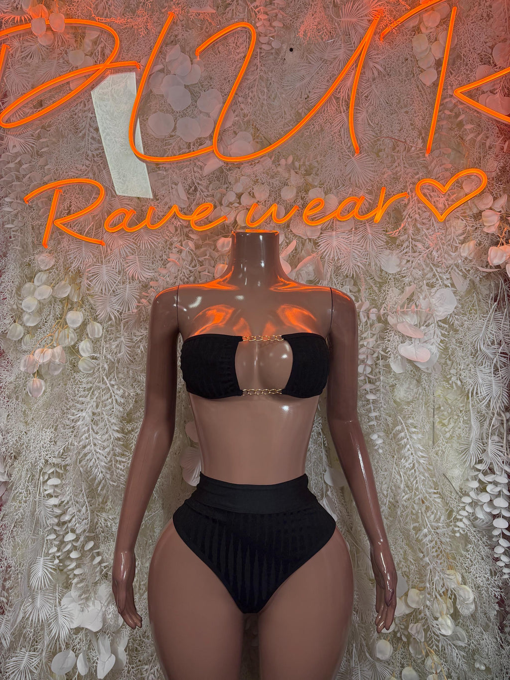 Black rave two-piece: black bandeau bra and high-cut bottoms, front view.