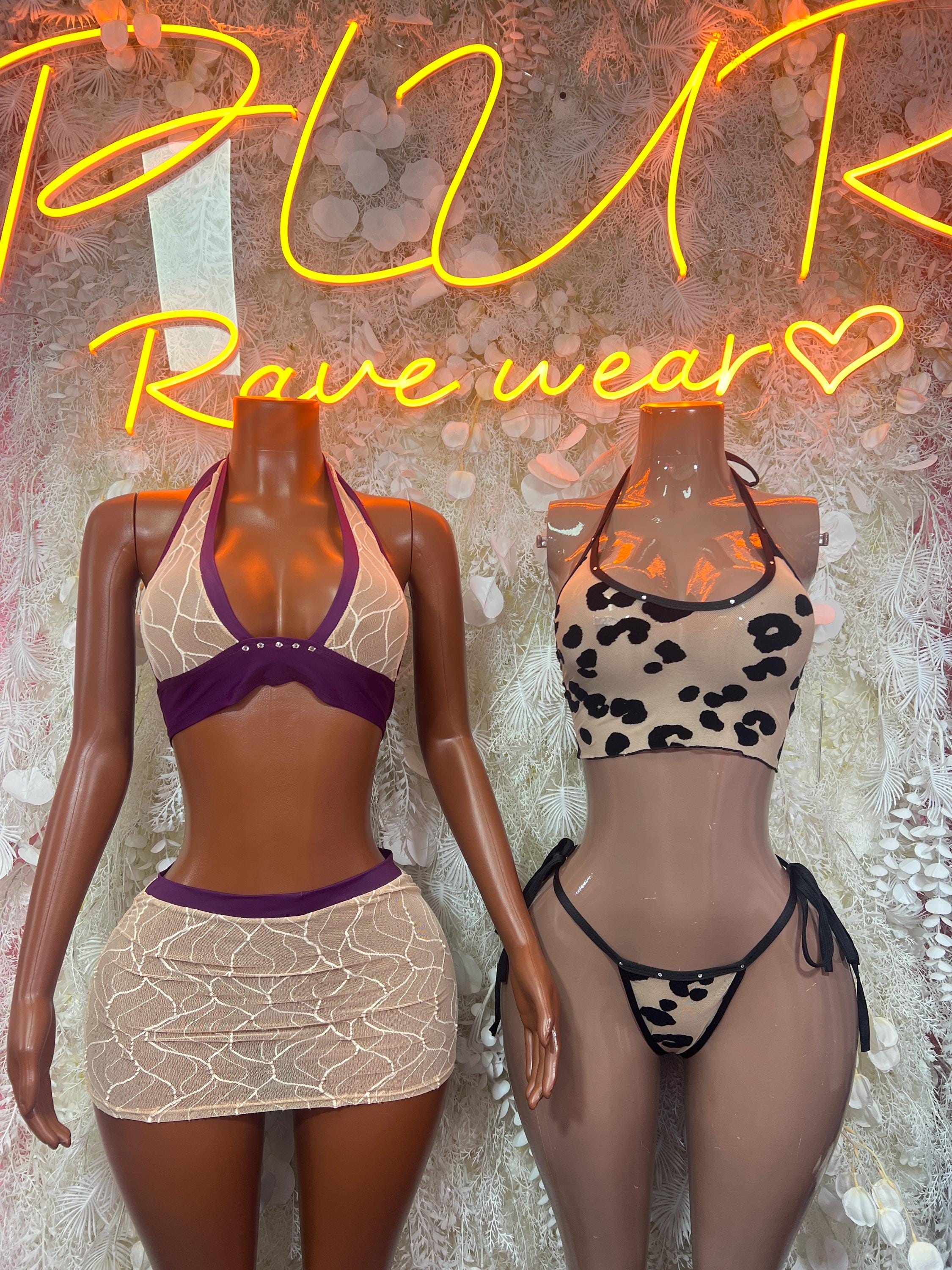 Two-piece skirt sets: purple top with beige web skirt, and black printed top with mini skirt