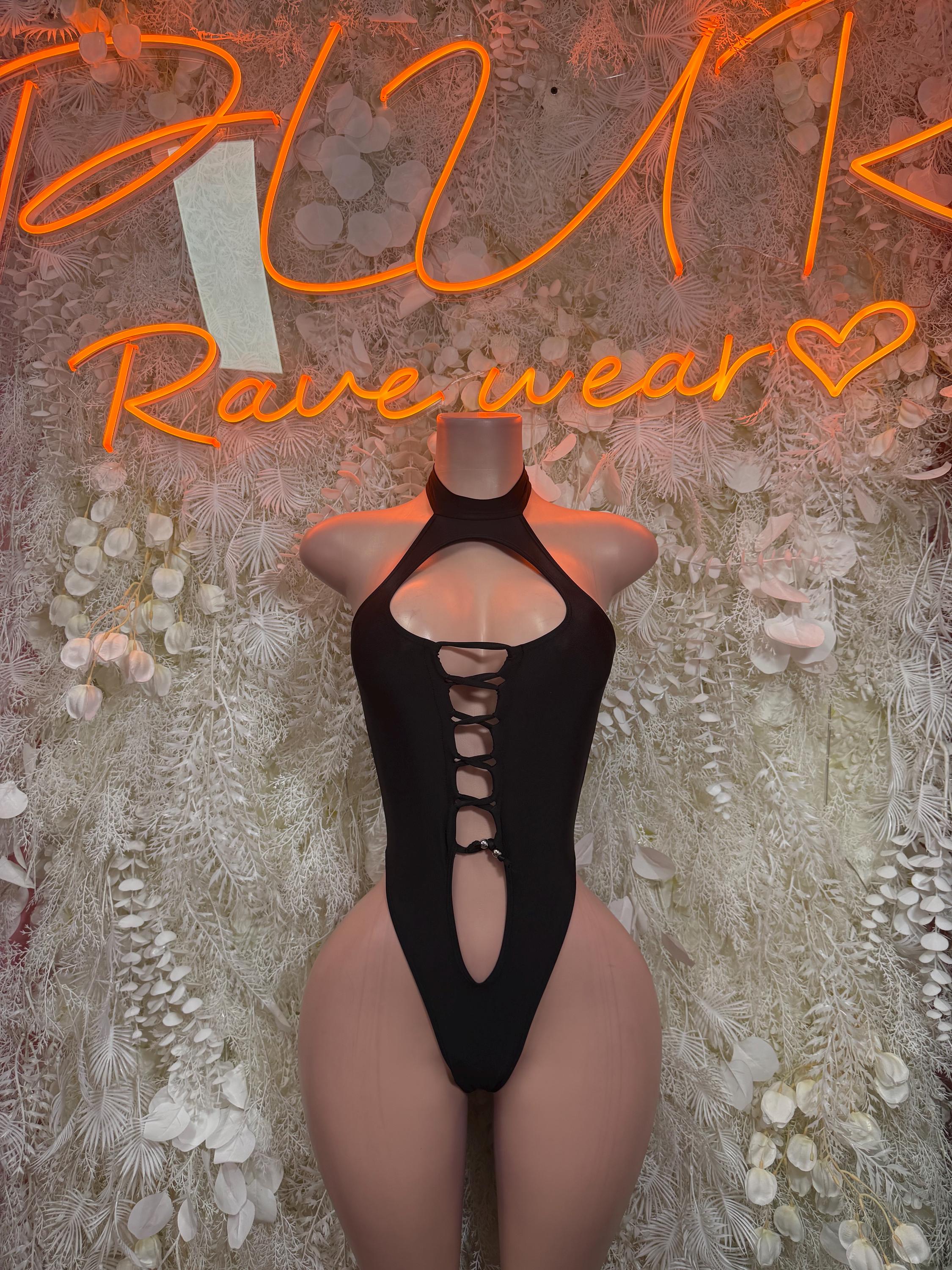Black lace-up cutout bodysuit with halter neckline and vertical chest cutout