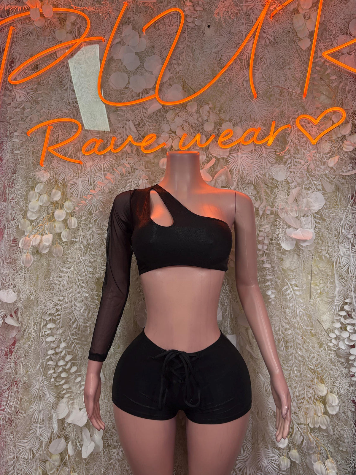 Black mesh one-shoulder crop top with chest cutout and drawstring shorts