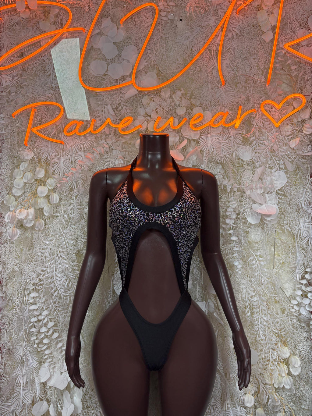 Black metallic bodysuit with front cutout and sheer long sleeves
