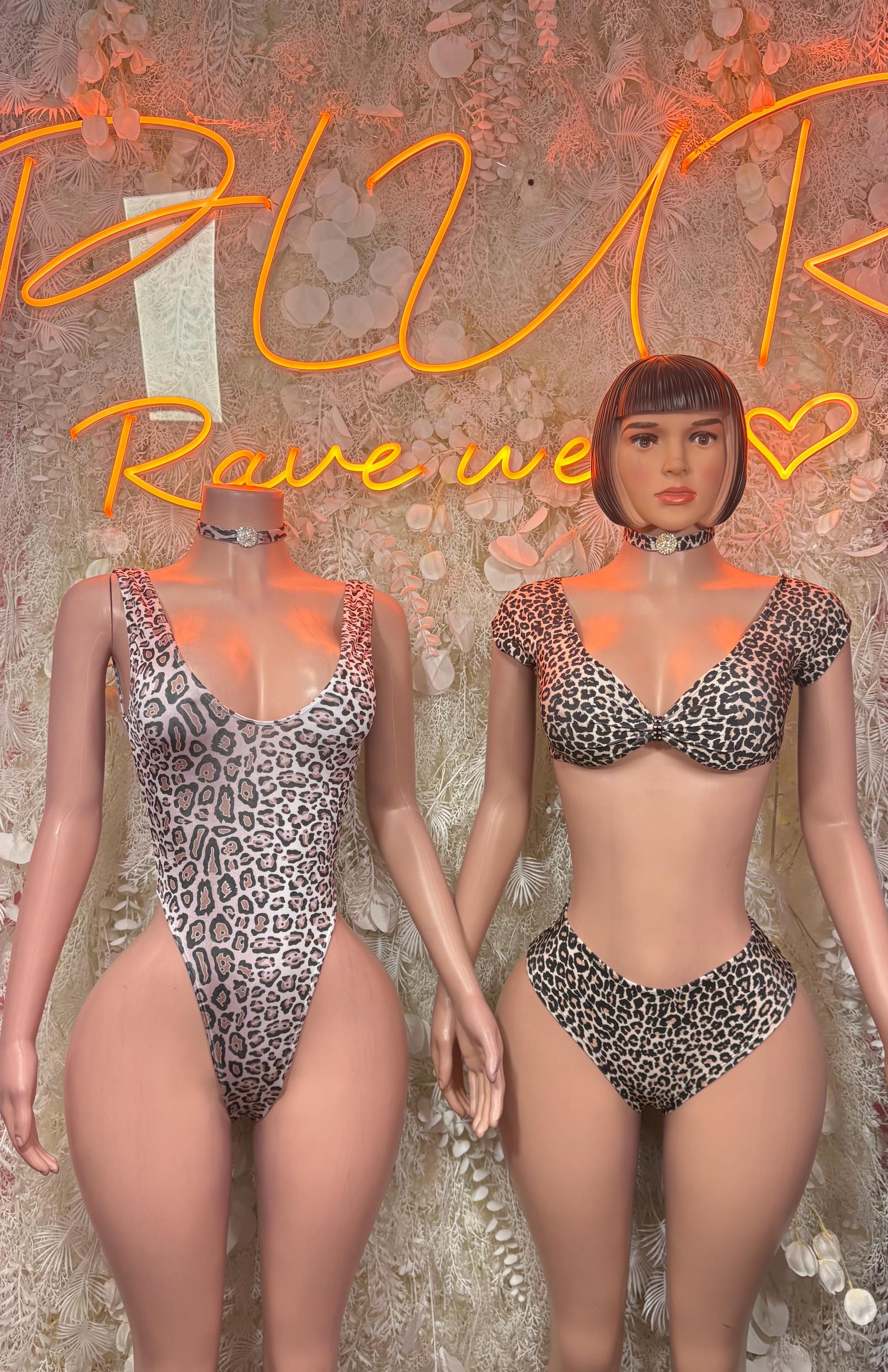 Leopard print two-piece choker bodysuit, angled view, scoop neckline and high-leg bottoms