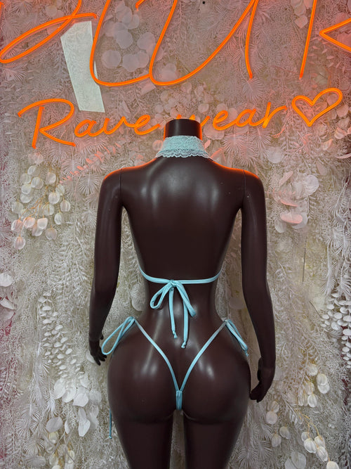 Back view of light blue lace bikini with tied straps and V-back thong-style briefs