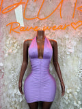 Lilac halter mini dress with ruched bodice and fitted skirt
