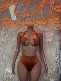 Orange two-piece dance outfit with glitter bra top and high-rise bikini bottoms