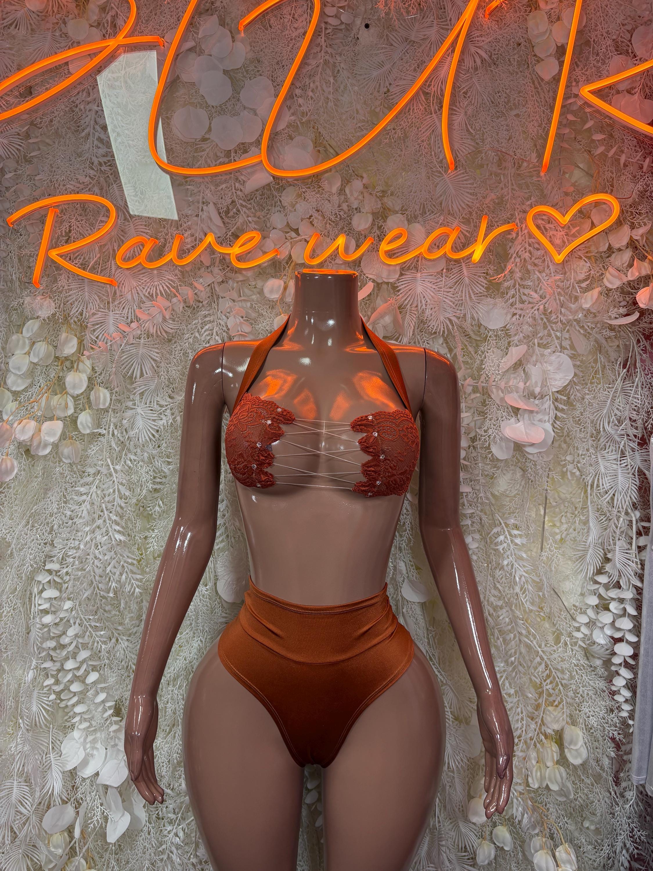 Orange two-piece dance outfit with glitter bra top and high-rise bikini bottoms