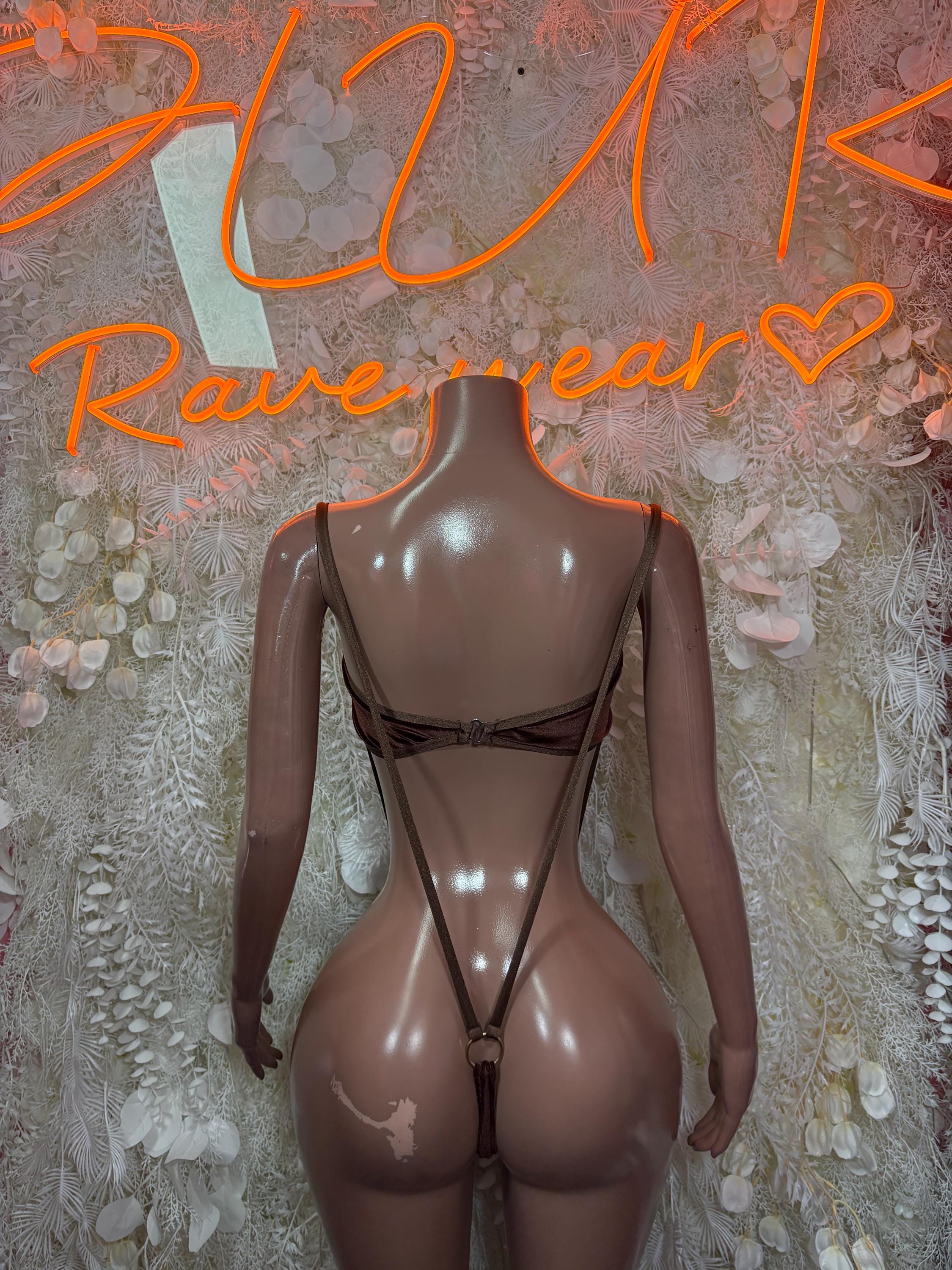 Brown velvet slingshot one-piece rave outfit with open back and crisscross strap detail