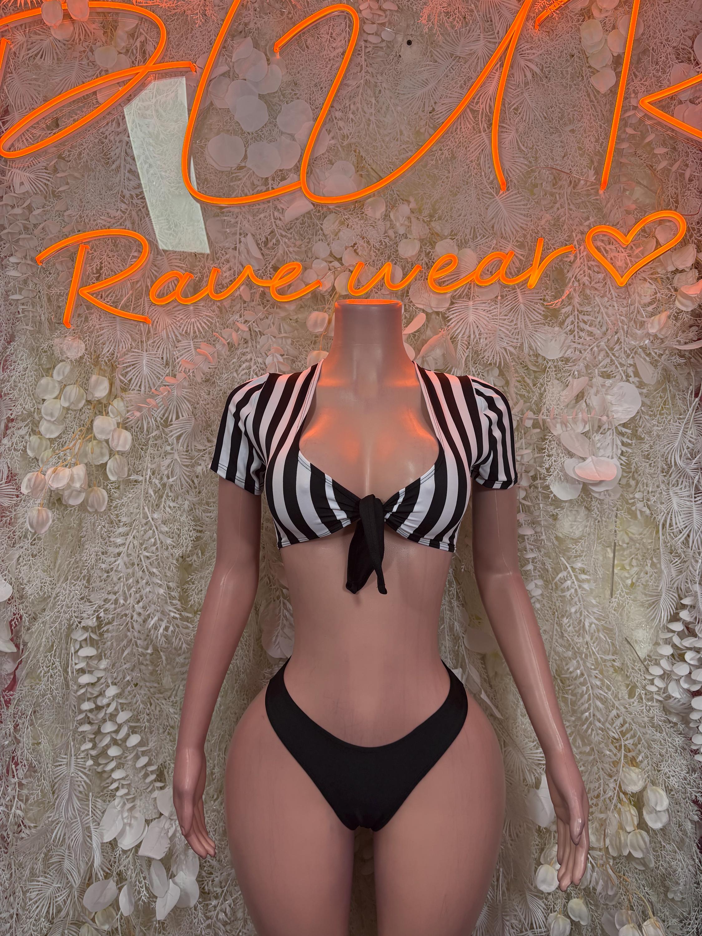 Referee bikini costume with black-and-white striped crop top and black bikini bottom
