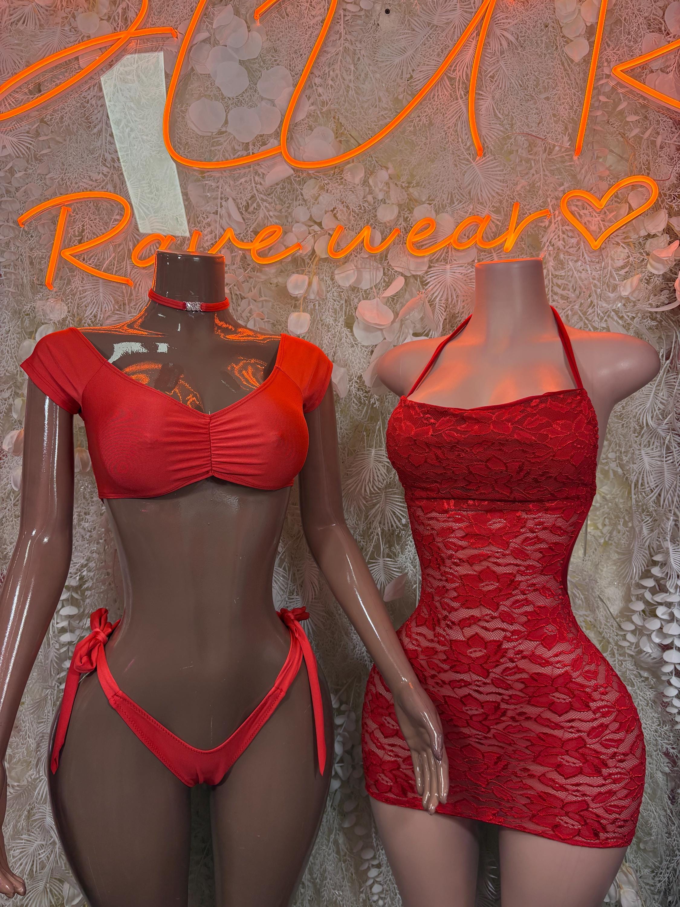Red two-piece bikini set with choker; lace-style bra top and strappy high-cut bottoms