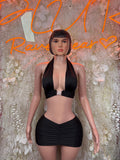 Black ruched mini skirt with crossover front and side seams