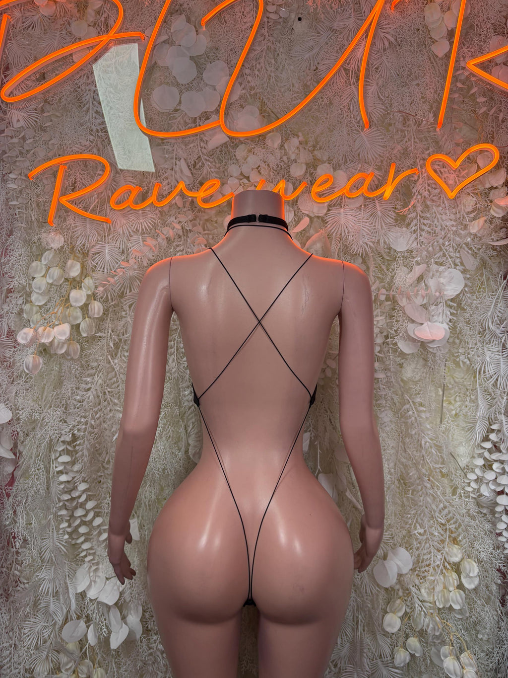 Black mesh bodysuit with choker, open back and crisscross straps