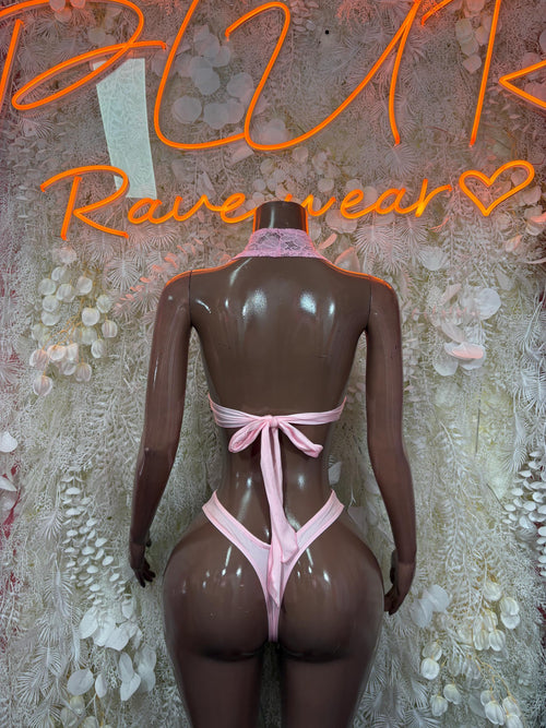 Baby pink lace two-piece outfit, back view with bralette and tied bikini bottoms