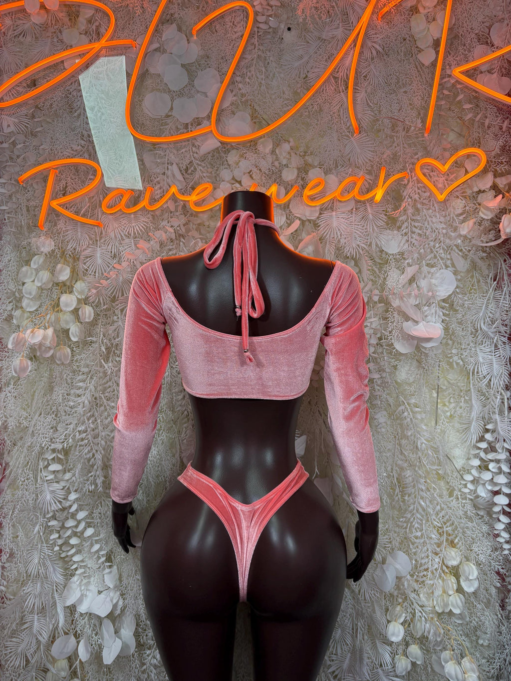 Peach velvet rave two-piece: cropped long-sleeve top with lace-up back and high-cut bottom