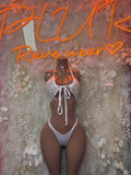 White two-piece dancewear set with halter top and string-tie thong bottoms
