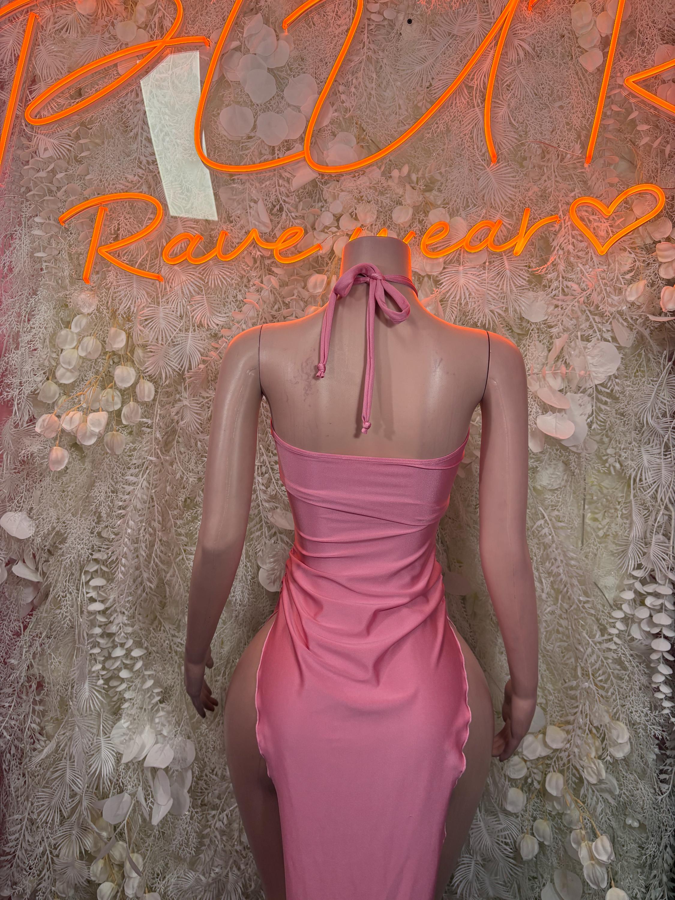 Pink open-back halter cutout gown with ruched waist