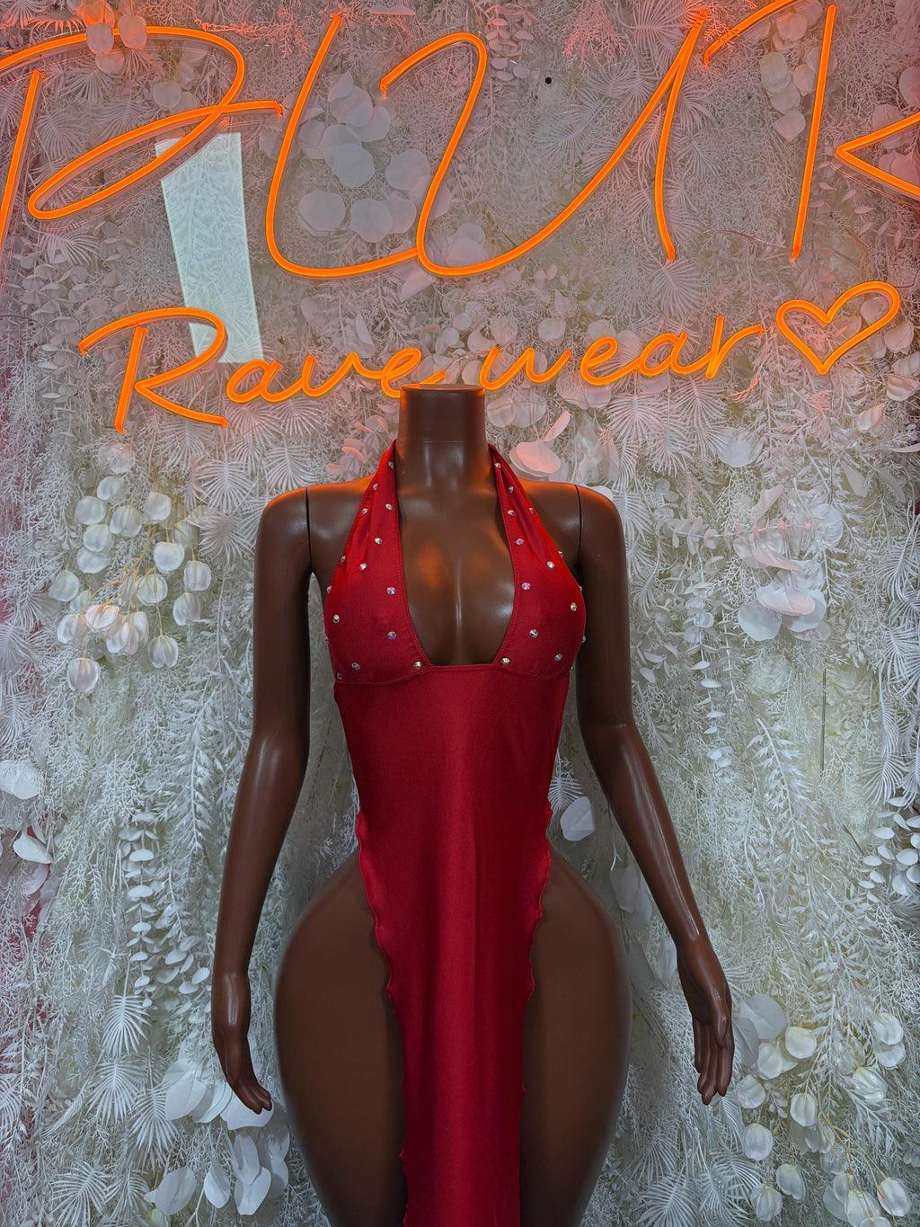 Red halter neck rhinestone gown with deep V front and open back