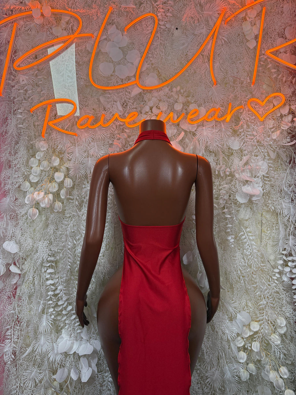 Red halter neck rhinestone gown, open back and low scoop back neckline