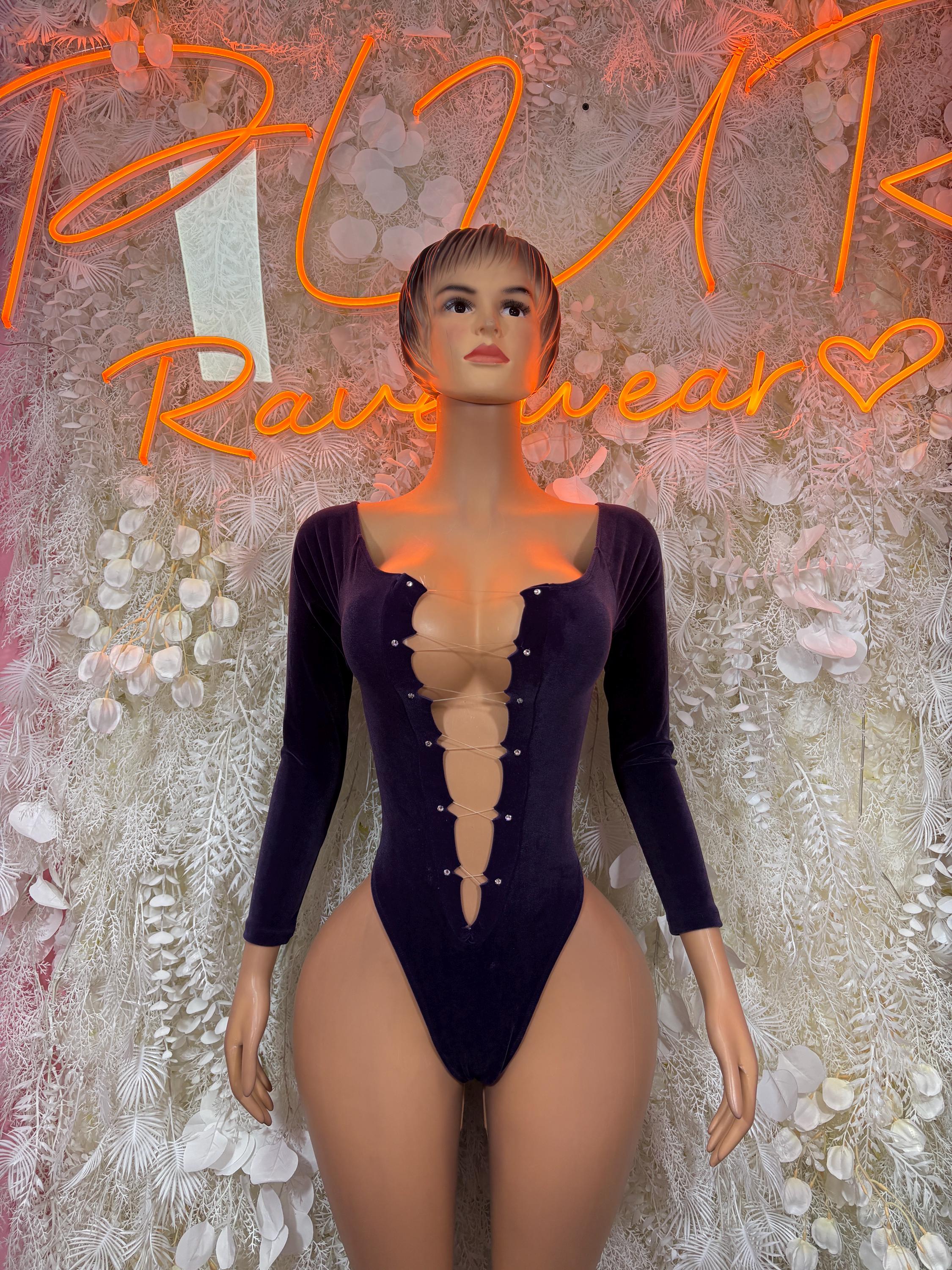 Purple velvet one-piece dancewear with long sleeves and button-front plunging neckline