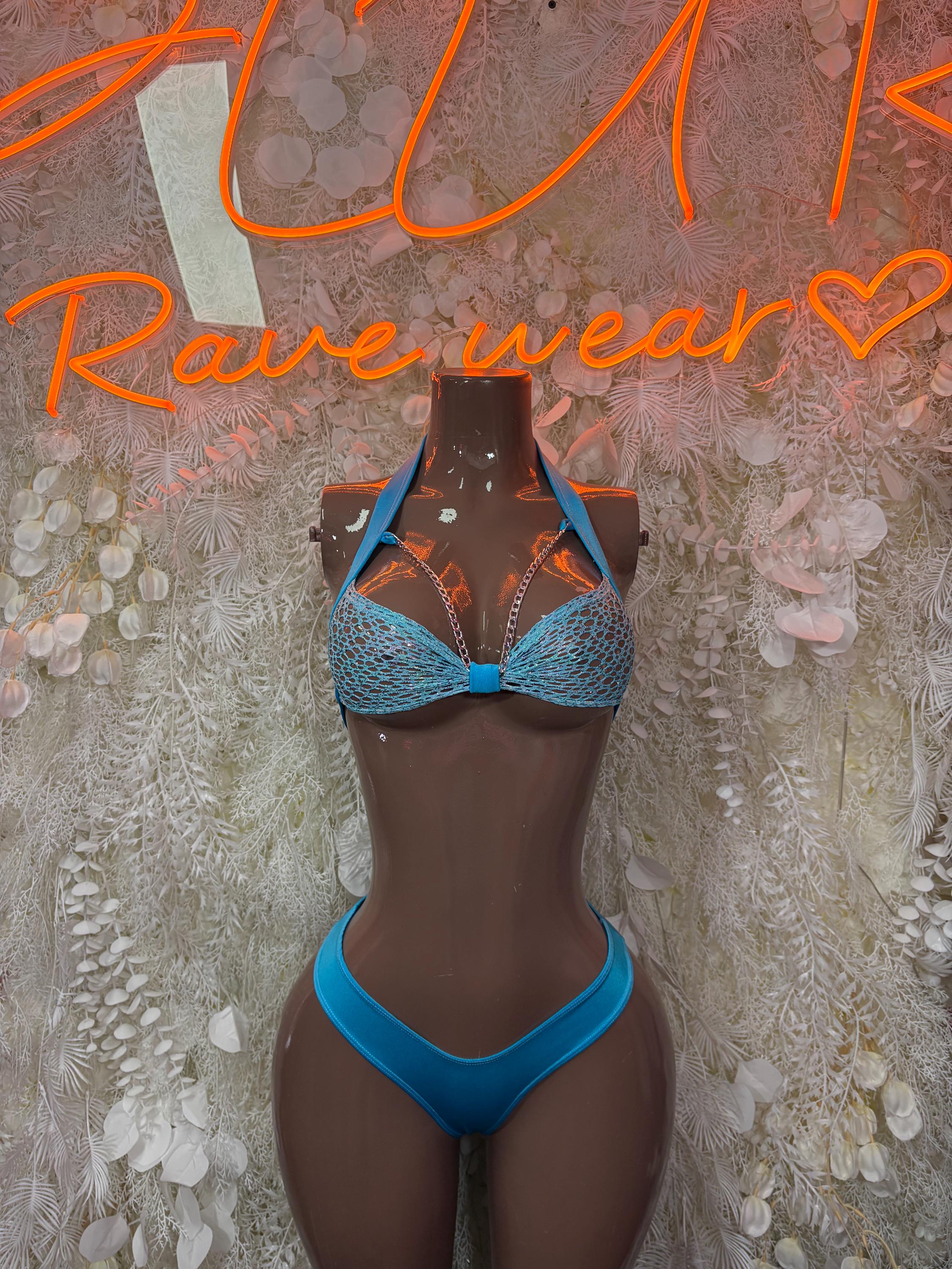 Blue lace two-piece rave swimsuit set on mannequin, triangle bra and briefs