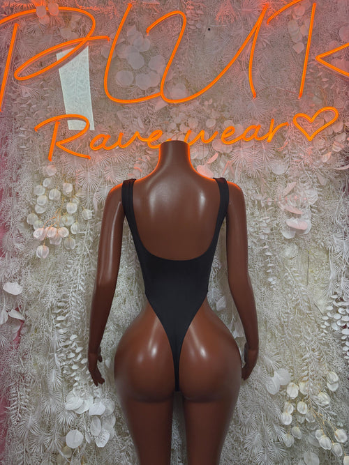 Black lace-up bodysuit back view with V-shaped neckline and cutout back