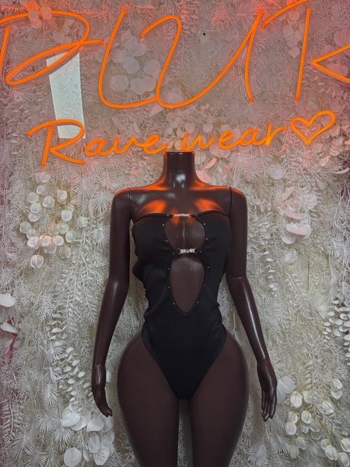 Black sheer long-sleeve bodysuit with deep V neckline and lace-up front