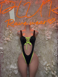 Black neon lace-up bodysuit with keyhole cutout and neon green trim, front view