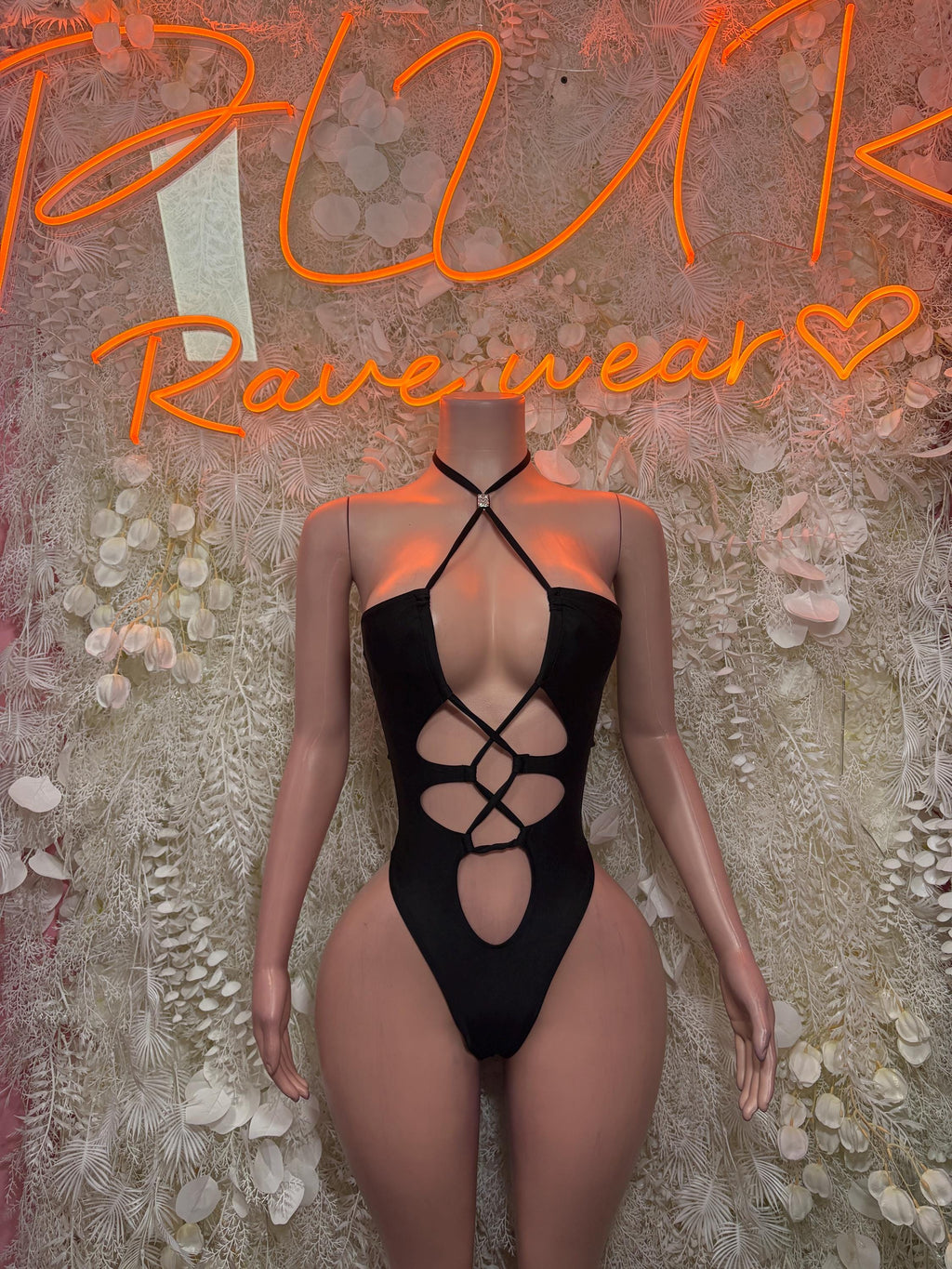 Black festival bodysuit with crisscross back straps and front oval cutouts