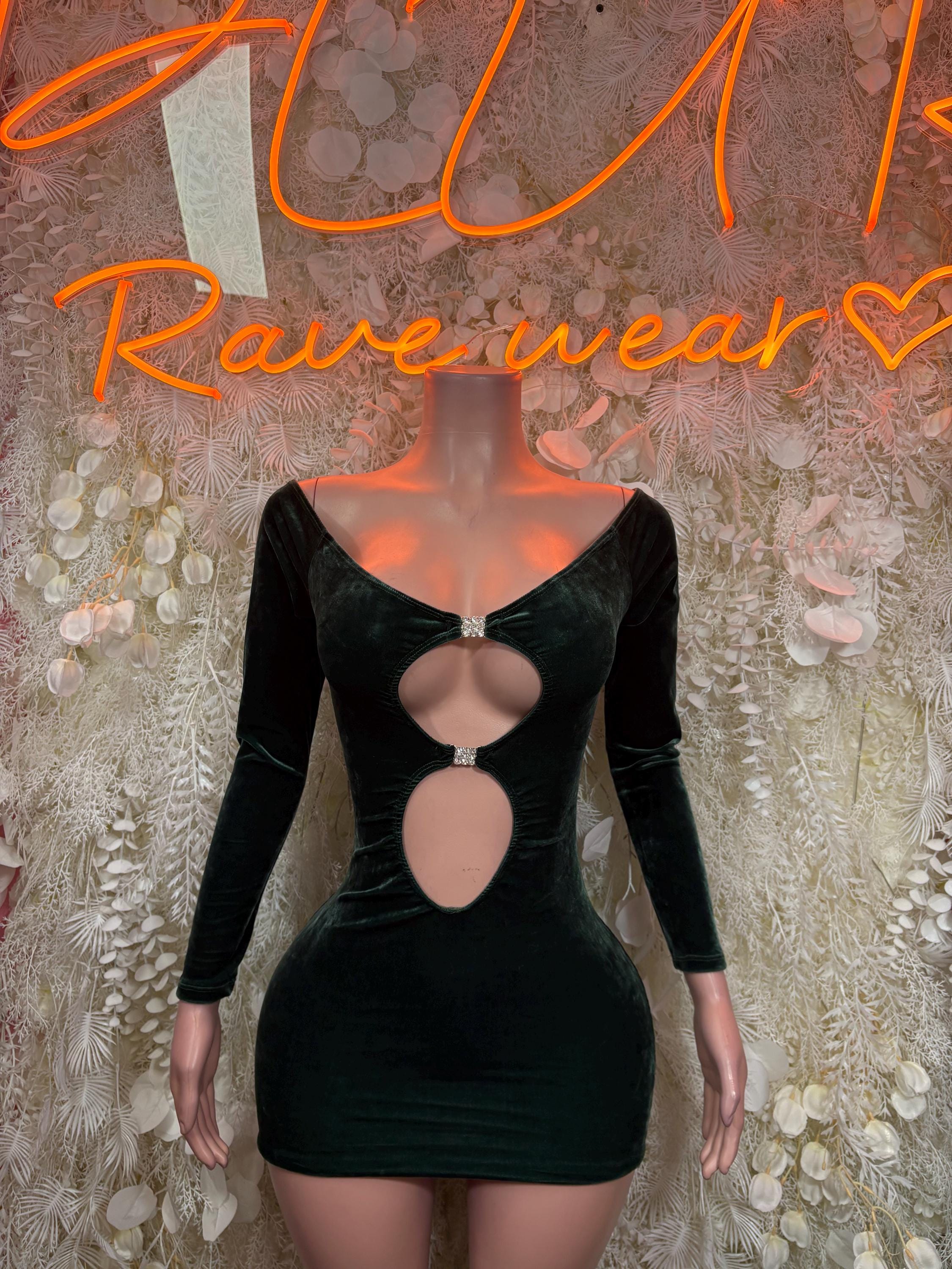 Dark green velvet mini dress with long sleeves, oval cutout neckline and waist