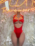 Red halter one-piece bodysuit with front cutout and clasp strap detail