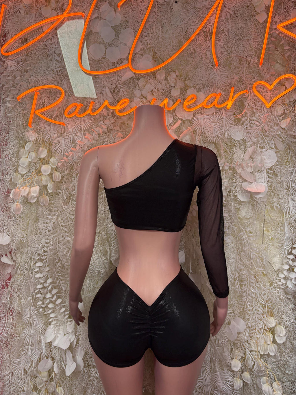 Black mesh one-shoulder crop top with open back and drawstring shorts