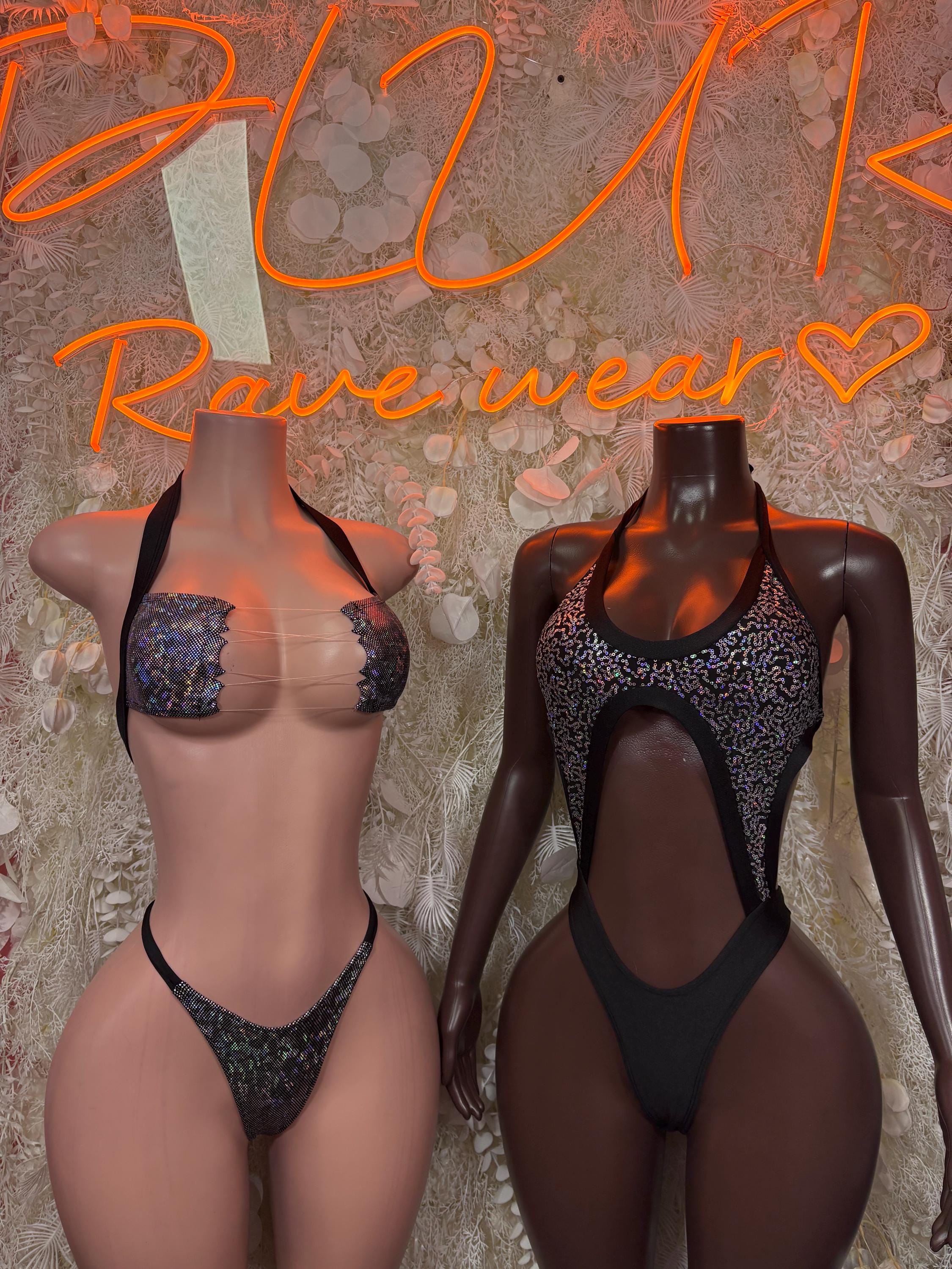 Black metallic bodysuit with front cutout, sheer straps and high-leg bottom