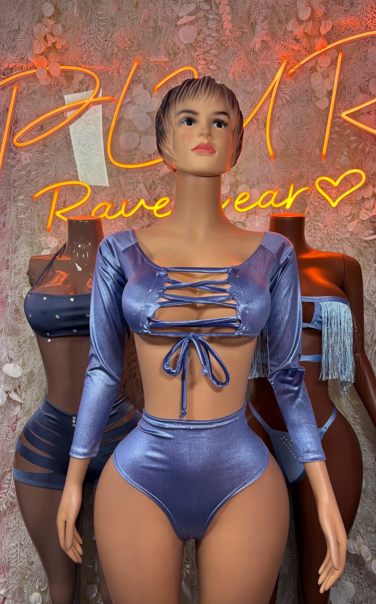 Blue metallic two-piece bodysuit with long sleeves, bow-tie crisscross front